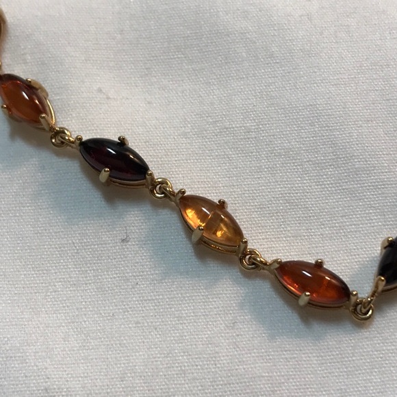 Avon necklace in gold tone, fold over clasp, 16 in length, stones multicolor - Picture 6 of 10